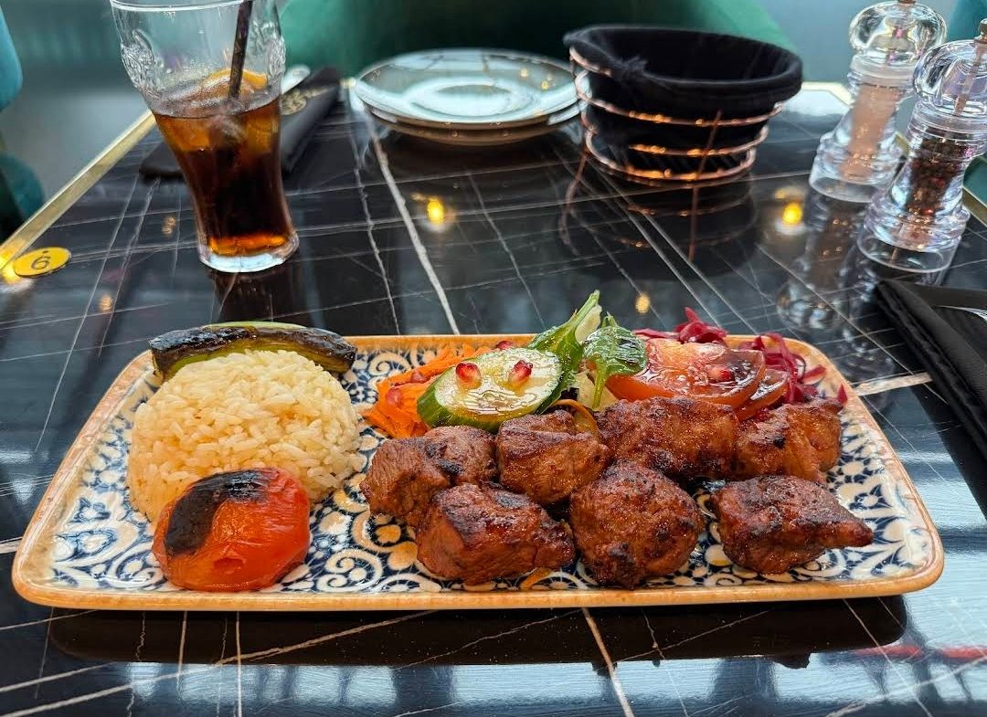 Charcoal-grilled plates on the pass at Tavus